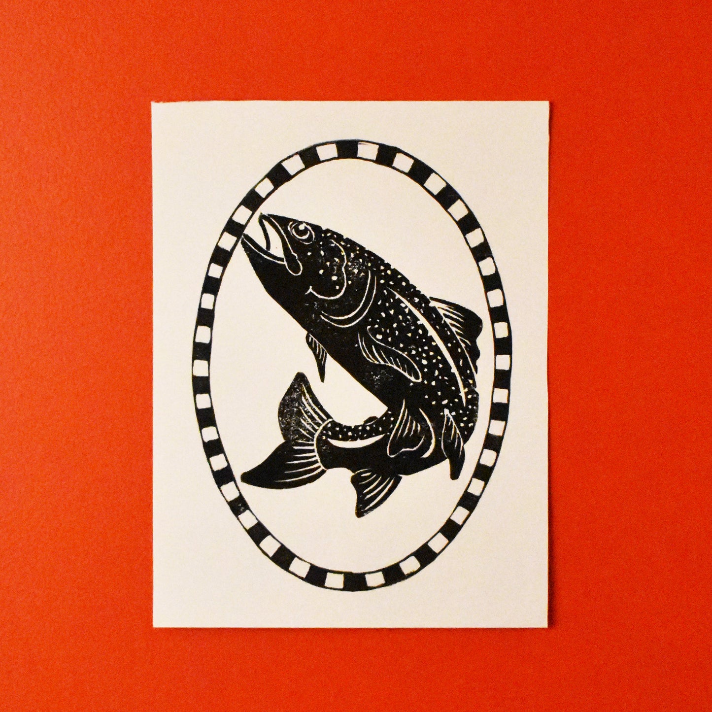 young fish - checkered frame - single linoleum print on white