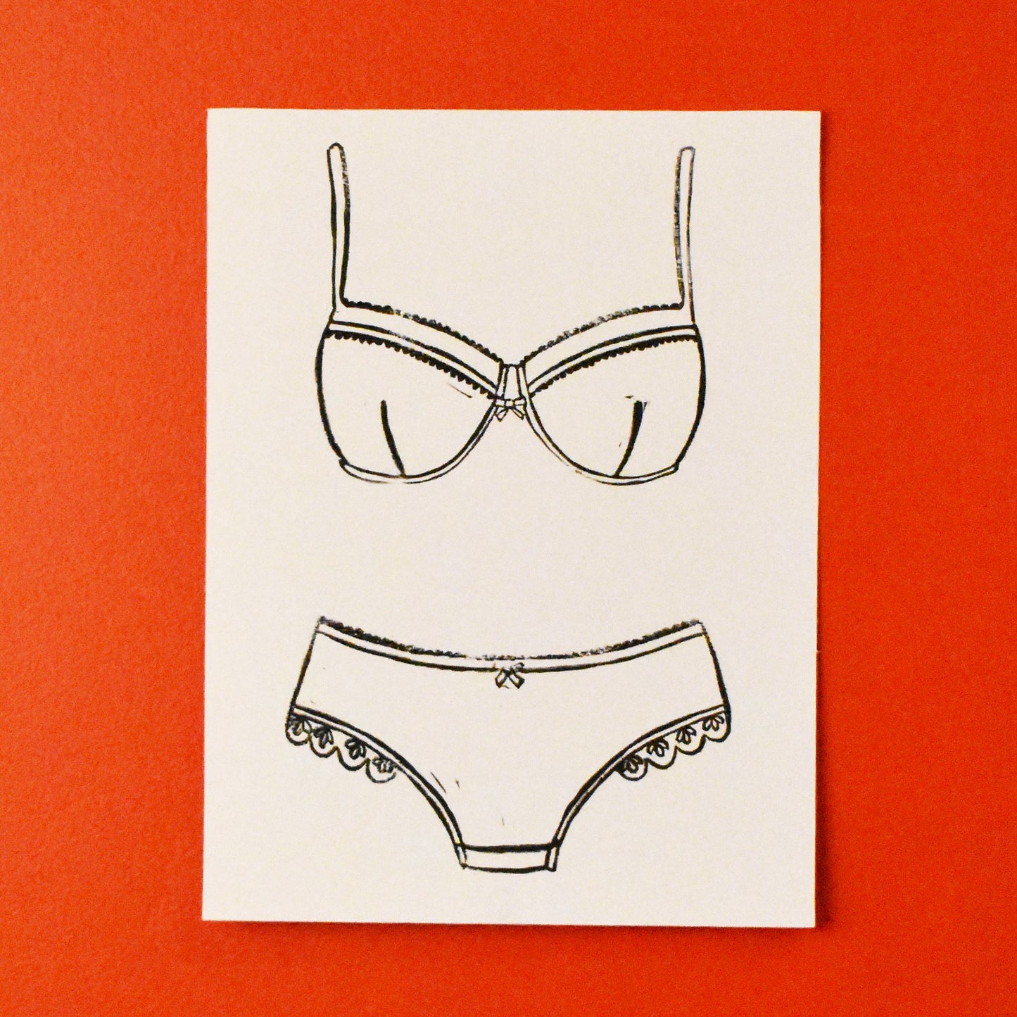 intimates - single linoleum print on white