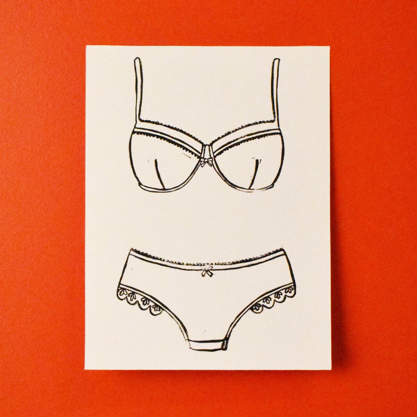 intimates - single linoleum print on white