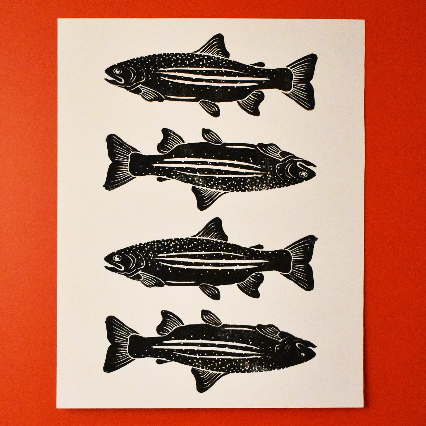 stacked fish - single linoleum print on white